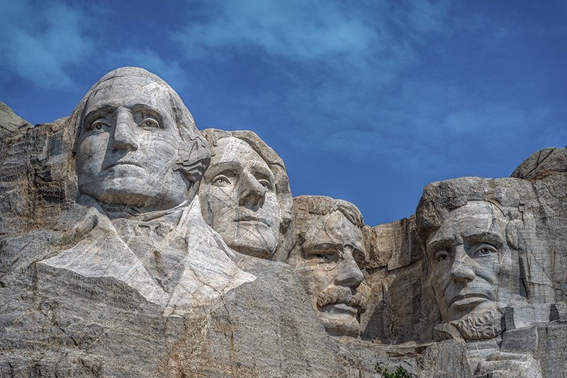 Three of four of the men featured on Mount Rushmore were wealthy American presidents.
